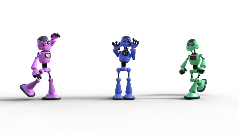 Drei Personen spielen Roboter-Steuerung, zwei stehen Rücken an Rücken